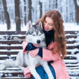 demo-attachment-38-woman-sitting-on-the-bench-with-siberian-husky-PS9ZX58